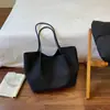 Bolso tote nuevo de alta calidad y gran capacidad para mujer 2026, adecuado para el trabajo y los desplazamientos, con un patrón tejido, diseño retro de moda y color sólido