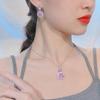 Collar de imitación de circonita rosa europea y americana transfronteriza con traje de diamantes de cristal rosa flor de cerezo, pendientes largos de botón de diamantes rosas Argyle