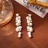 Brincos Longos de Pérola Vintage Europeus e Americanos Resistentes, Elegantes e Estilosos, Brincos Ousados e Grandiosos para Mulheres, com Design Único