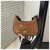 Bolso de axila con lazo de tela esmerilada vintage nuevo, bolso de hombro colorido bordado de nicho, bolso cruzado para el día a día para mujer