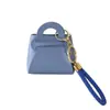 Bolsa para monedas pequeña de color caramelo linda estilo coreano, monedero, llavero para llaves, bolsa pequeña creativa de macarrón para llevar en la mano