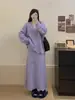 Traje de punto de estilo suave para mujer, nuevo modelo otoño e invierno 2026, conjunto de dos piezas: cárdigan suelto de punto con cuello en V + falda de cintura alta
