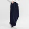 Pantalones para niño 2026 primavera y otoño nuevo estilo pantalones casuales holgados para niño pantalones de pierna curva de moda para exteriores para principios de otoño