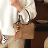 Bolso de mano para mujer estilo coreano transfronterizo 2026 nuevo bolso versátil bolso cubo retro simple bolso de hombro cruzado