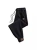 Pantalones casuales al por mayor para hombre otoño e invierno forrados de polar engrosados pantalones deportivos para hombre pantalones de punta suelta una generación de pelo