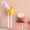 Venta caliente estante de almacenamiento portadental sin perforaciones para colgar en la pared del baño estante para cepillo de dientes estante para cepillo de lavado de cara venta directa de fábrica