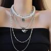 Collar de perlas multicapa con costuras de estilo barroco para mujer, estilo europeo y americano, cadena de clavícula de alta gama que combina con todo, a la moda.