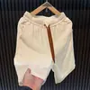 Pantalones Rectos de Cinco Puntos de Lujo Ligero Marca de Moda Lino para Hombre Verano Nuevos Pantalones Cortos Casuales Juventud Color Sólido Cintura Elástica de Longitud Media