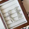 Brincos Elegantes Longos Super Brilhantes de Laço com Diamantes para Mulheres, Design de Nicho, Brincos Modernos e Versáteis, Brincos de Alta Qualidade