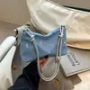 Bolso de Hombro de Lona Bordado Casual de Nicho Denim 2026 Nueva Moda Gran Capacidad Tote para Viajes Versátil