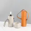 Caja decorativa moderna de lujo ligero de alta gama, cilindro de cuero portátil para vino, para sala de estar, recibidor, estudio, hotel y decoración del hogar