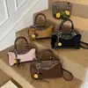 Bolsa Transversal Feminina Estilo Coreano Nicho Retrô 2025 Nova Bolsa Almofada com Costura em Camurça Bolsa de Ombro Simples na Moda