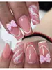 Uñas Portátiles Europeas y Americanas Lazo Rosa Brillo Degradado Uñas Postizas Uñas de Tubo Mediano Uñas Portátiles Transfronterizas Venta al por Mayor