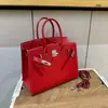 2026 Nuevo Bolso de Mano de Moda Tejido Plano Platino Hebilla Plateada Bolso de Mano de Alta Gama Bolso de Hombro Versátil Bolso Cruzado