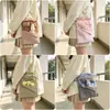 Nueva bolsa de almacenamiento estudiantil versátil a cuadros con temática de muñecas, bolsa de tela linda estilo coreano con relleno de algodón, bolso cruzado para mujer para llevar al hombro para teléfonos