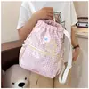Mochila casual para mujer de cuadros pequeños, con un diseño fresco y elegante, cierre de cordón y lindos estampados de dibujos animados