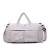 Bolsa de gimnasio de gran capacidad y peso ligero con compartimentos separados para artículos húmedos y secos, un diseño casual y simple, adecuada para viajes cortos y con un compartimento separado para zapatos para actividades al aire libre.