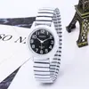 Charon Xapwv Novo Relógio de Casal com Pulseira de Aço e Óleo Branco e Preto Moda Masculina Relógio Feminino Atacado Fornecimento Direto da Fábrica