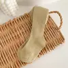 Medias de primavera y otoño para niñas de importación, leggings infantiles de color liso con rayas verticales, medias de cuerpo entero versátiles y coloridas para bebés y niños pequeños