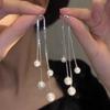 Pendientes de perlas con borlas largas y sencillas de moda 2023, nuevos pendientes de lujo ligeros y modernos que adelgazan el rostro.