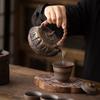 Estufa de alcohol Dunhuang de gres chino vidriado de hierro chapado en oro, tetera lateral, estufa redonda, calentador de té, estufa de té, dispositivo para preparar té al aire libre