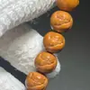Pulsera de bola de gato tallada con cabeza de mono de alta calidad, lisa y en buen estado, alto contenido de aceite, alta densidad, fácil de manejar, adecuada tanto para hombres como para mujeres, disponible al por mayor y envío directo
