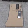 Pantalones casuales de negocios de alta gama serie B para hombre de cuatro estaciones, de algodón puro lavado, color liso para primavera y otoño, de cintura media, corte recto