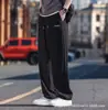Pantalones de seda de hielo Amazon transfronterizos, pantalones cortos de secado rápido para hombre, pantalones largos casuales de estilo coreano modernos de corte holgado, pierna ajustada atlética
