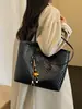 Bolso tejido de patrón retro de moda transfronterizo para mujer 2026 nuevo bolso de hombro para el trabajo bolso de mano de gran capacidad bolso tote moderno