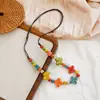 Accesorio de collar de cerámica estilo étnico vintage para mujer, diseño de corazón y estrella de alta gama, cadena larga para suéter, simple y versátil
