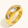 Anillos Cruzados Europeos y Americanos Ins con Tres Circonitas Acero Inoxidable Chapado en Oro de 18K Color Champán Elegante Nicho Lujo Accesible Joyería de Mano para Mujeres