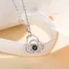 Collar Proyector de Recuerdos de Amor 100 Idiomas Transfronterizo para Parejas, Colgante de Corazón Doble, Estilo Lujo Ligero