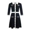 Vestido de Punto Acanalado de Manga Larga con Cuello Polo y Bloques de Color, de Botones, Estilo Francés de Nicho Marca M, Falda Midi, Negro, para Mujer, Primavera y Otoño 2026