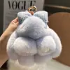 Llavero de Conejo Rex de Piel Genuina Lazo Lindo Conejo Llavero de Coche Adorable Conejo de Orejas Caídas Juguete de Peluche Colgante de Bolsa Conejo de Peluche