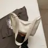 Bolsa de Couro Macio Design de Nicho Transfronteiriça Formato de Dumpling para Mulheres 2026 Novo Modelo Bolsa Transversal de Alto Padrão Bolsa de Ombro para o Dia a Dia