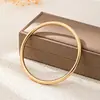 Tendência de Moda Quente Transfronteiriça Pulseira com Padrão Geométrico Exagerado Torcido Martelado de Personalidade Adequada para Mulheres Usarem em Festas na Rua
