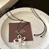 Collar de Cuerda de Cera con Flor Grande Hueca de Tirar para Mujer Estilo Dulce Fresco Estilo Europeo y Americano Moda Nicho Cadena de Suéter de Gama Alta