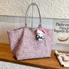 Bolsa de lona con estampado de leopardo para mujer, bolsa de gran capacidad, nuevo modelo 2026, bolso de mano de estrella transfronterizo, bolso de hombro para el trabajo, bolsa versátil