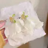 Brincos de Chiffon com Flores Estilo Chá Super Fada para Mulheres 2025 Novo Atmosfera de Feriado Versátil Brincos Exagerados Brincos