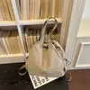 Bolso de mujer multipropósito, nuevo bolso de tela para las cuatro estaciones, mochila de viaje de un solo hombro, versión coreana de moda, mochila de gran capacidad para el trabajo y salidas