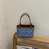 Bolso pequeño súper popular para mujer, nuevo y moderno bolso de cubo de verano para el trabajo, de hombro y cruzado