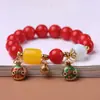 Pulsera de Raíz de Bodhi de Jade Rojo Especificaciones 1.2 con Colgante de Campana de Oro Arena Pulsera de Rosario para Hombres y Mujeres Venta al por Mayor