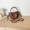 Bolso de Cubo Casual de Gran Capacidad 2026 Otoño/Invierno Nuevo Estilo Moderno Bolso de Hombro Versátil Retro Bolso de Mano