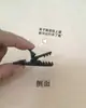 Pinza de pico de pato de plástico pinza de mano negra pinza de cadena para pezones