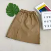 Falda de Cuero Rantuo para Niñas con Abertura, de Longitud Media, Cintura Alta Elástica, Artículo Popular de Tiktok, Estilo Ins, Stock Listo para Exportación, Dropshipping