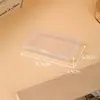 Caja pequeña de plástico rectangular 1.5 transfronteriza con agujeros para colgar, transparente, para guardar accesorios para el cabello de niños, joyas y otros artículos pequeños