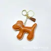 Pingente de Bolsa de Cachorrinho Desenho Animado Pingente Criativo para Chaveiro de Carro Pingente Grande para Capa de Celular de Cachorro Pulseira de Pulso com Pingente