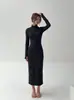 Vestido Negro Delgado Pequeño Bodycon Falda Otoño Invierno Falda Estilo Mujer Artículo Popular 2026 Nuevo Estilo Sensación de Alta Gama Vestido de Capa Interior