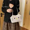 Linda bolsa de hombro tejida de dibujos animados con bordado de paja, nueva bolsa tote casual, elegante y minimalista para mujer 2026