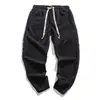 Pantalones de pana ajustados de moda para hombre, estilo chino, para primavera y otoño, pantalones casuales tipo harén de color liso, estilo retro japonés y coreano, comercio exterior